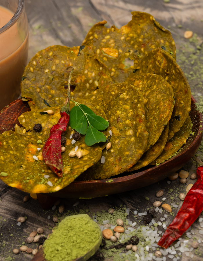 Moringa Moments – branded healthy snack combo on rustic background